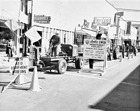 historic black and white photo of construction crews working in downtown Eugene