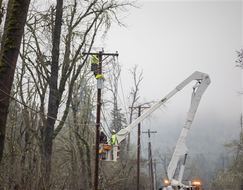 crew work on poles